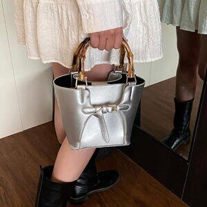 Neiman Marcus Silver Vegan Leather Bamboo Handle Buckle Bag